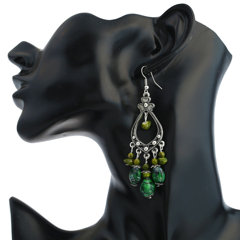 Wholesale Bohemian tassel vintage long carved earrings